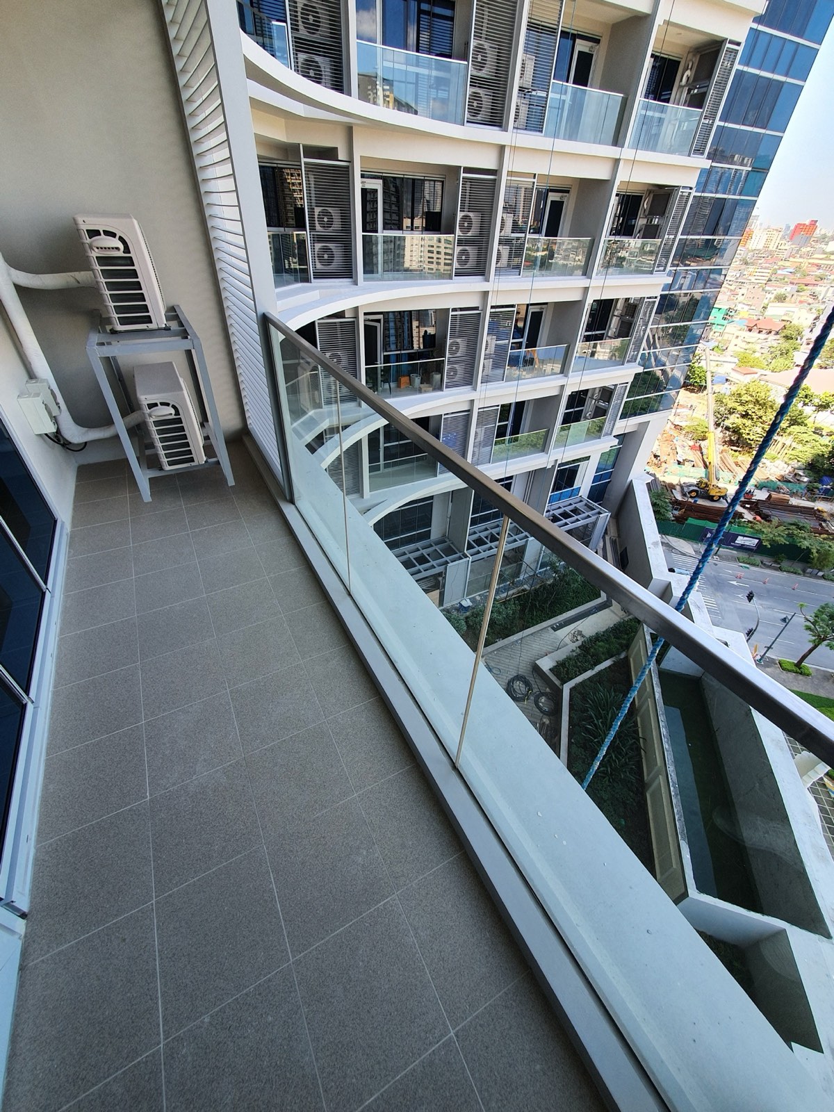 Uptown Parksuites Tower 2 Type U unit — balcony with BGC skyline view